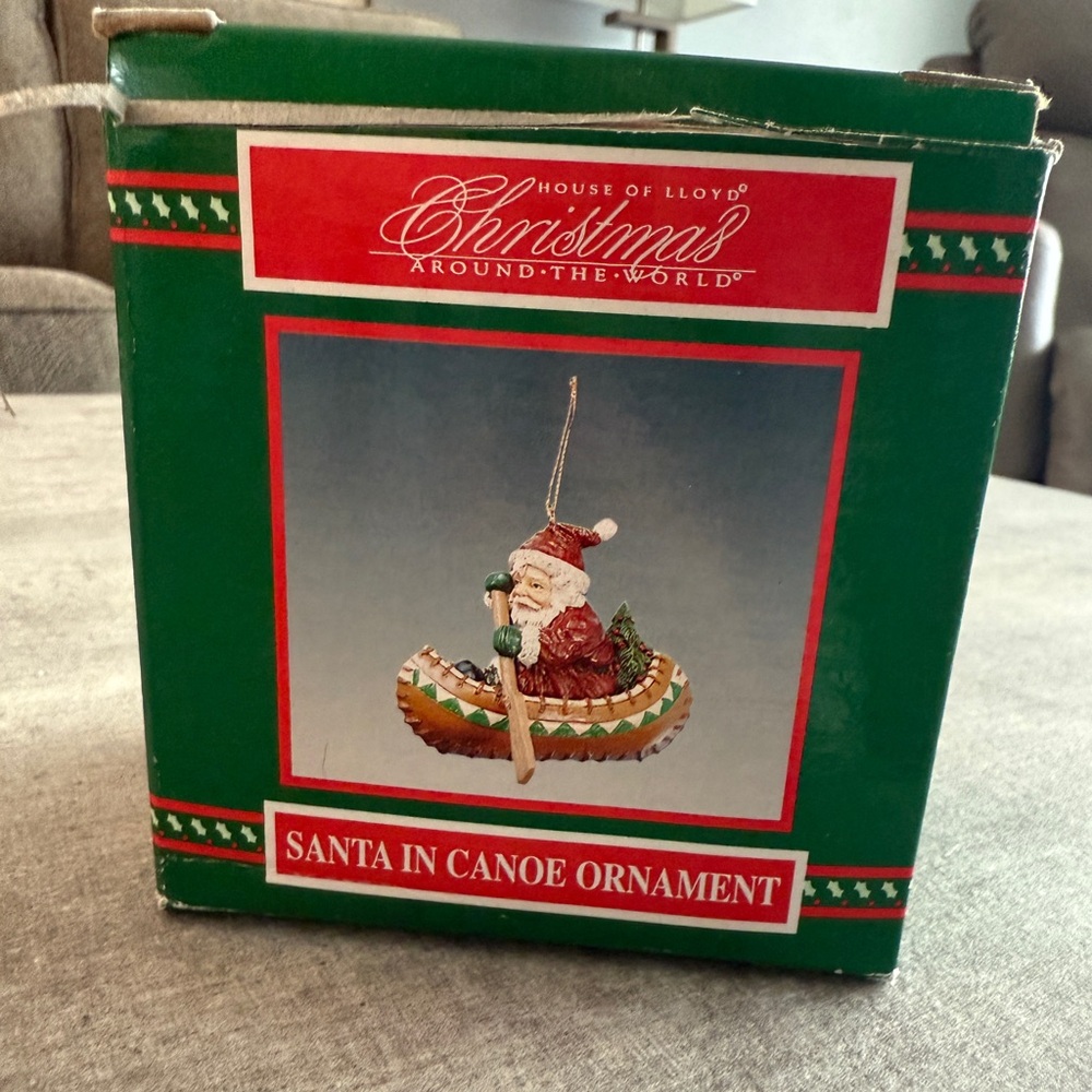 House of Lloyd Christmas Around the World – Santa in Canoe Ornament  – w/ Box